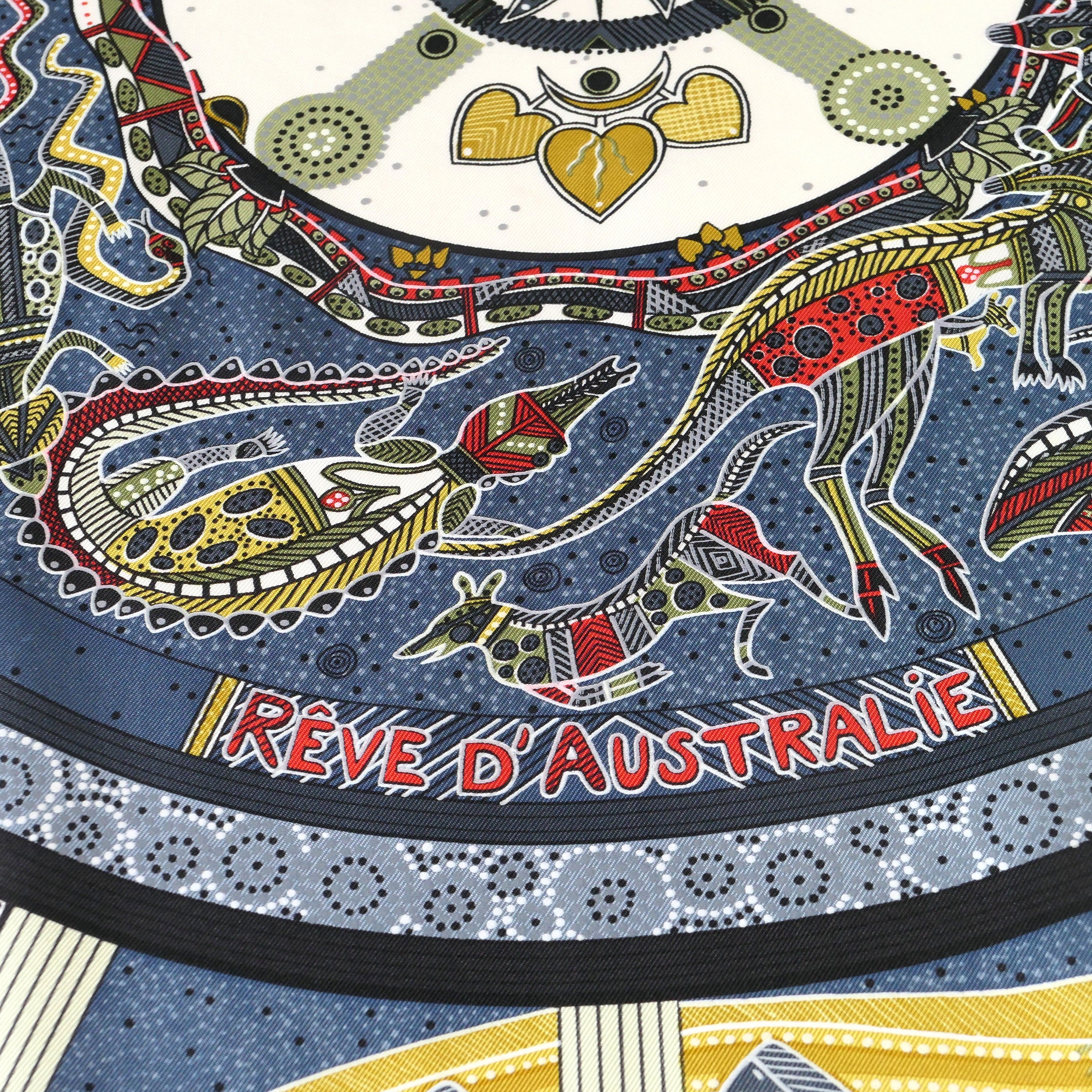 Carré Hermès Rêve d'Australie 90 cm soie, détail titre et kangourous totémiques