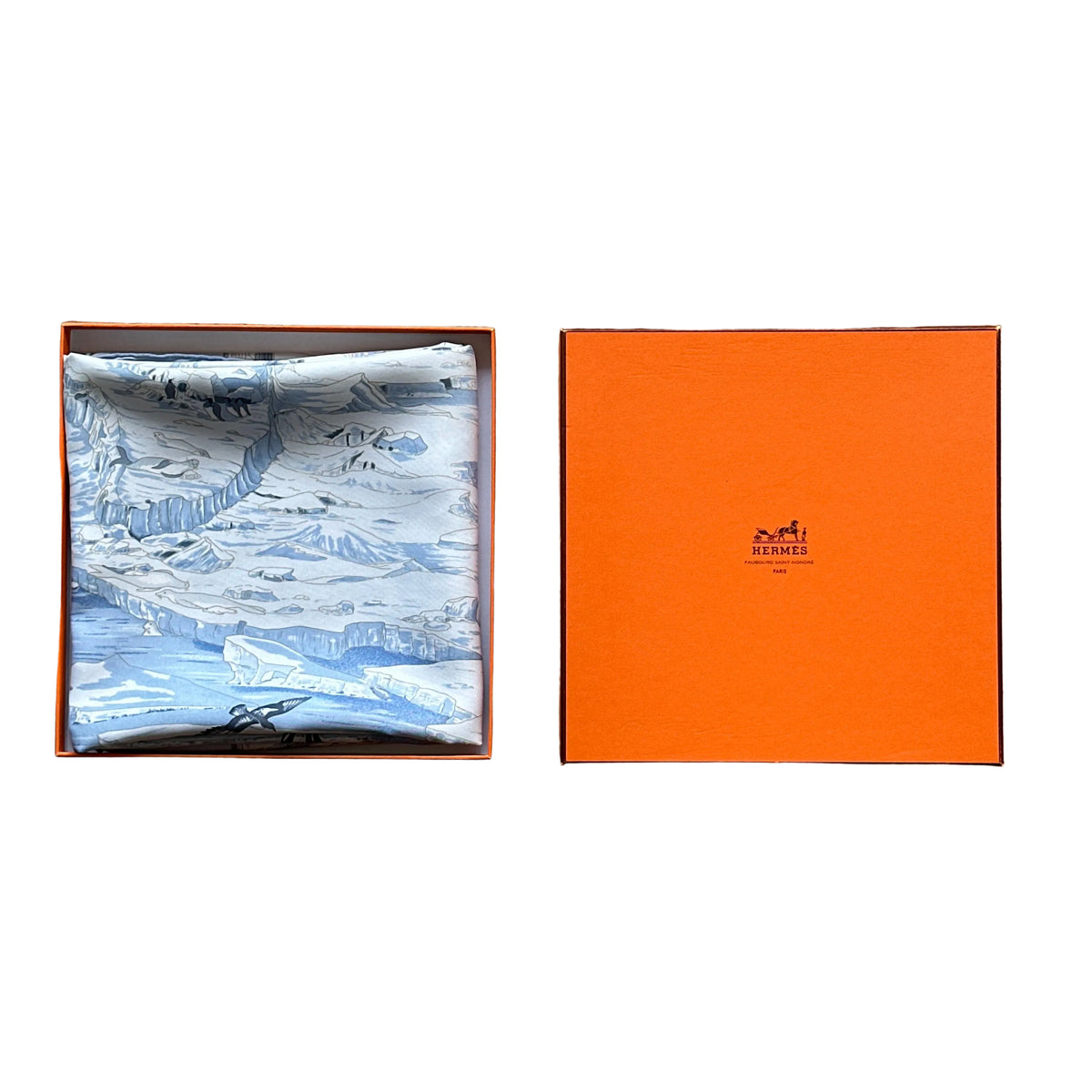 Carré Hermès Hommage à Shackleton Zoé Pauwels 90 cm soie, présentation avec boîte Hermès orange