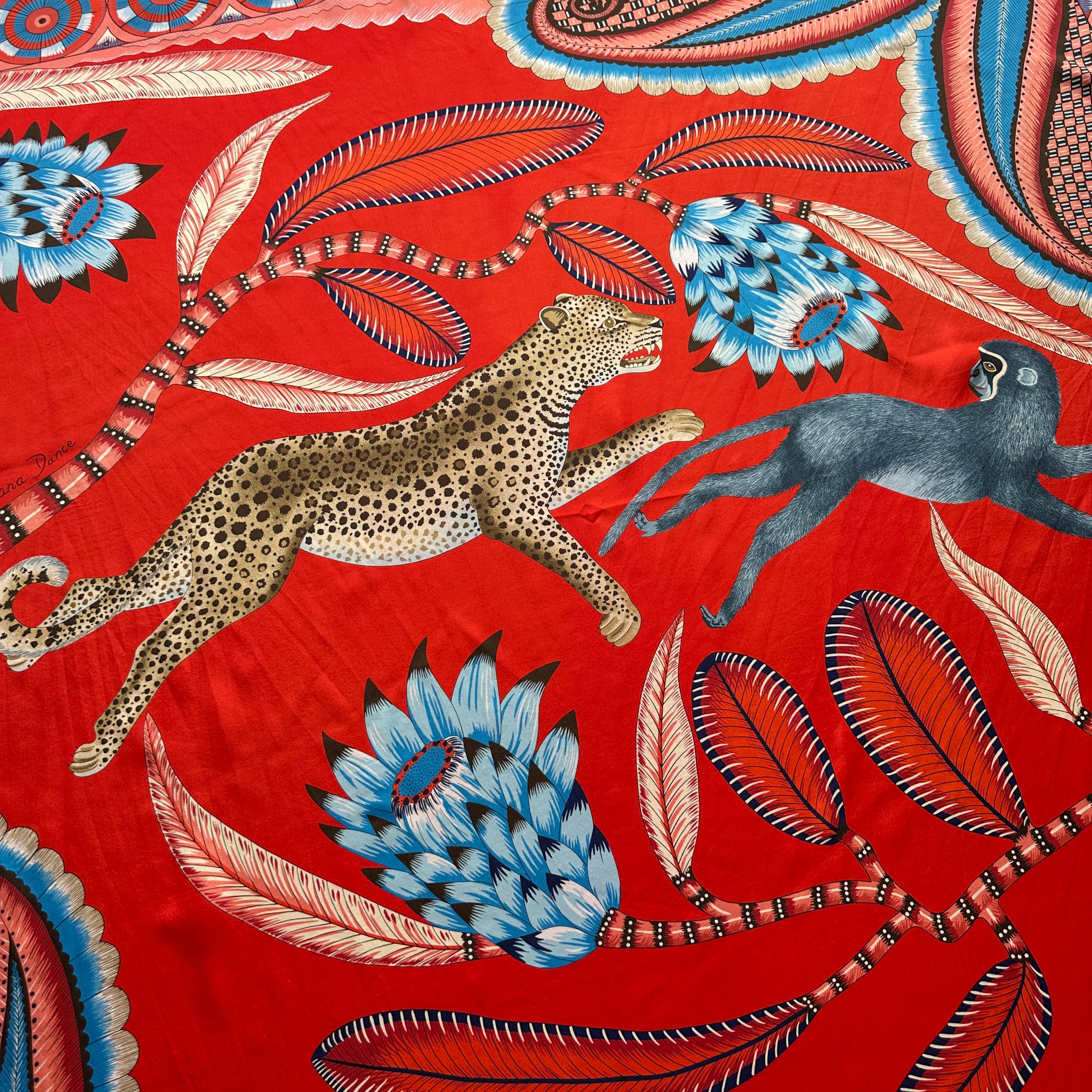 Détail du léopard en plein bond sur le châle Hermès "The Savana Dance"